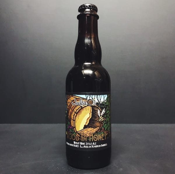 Jackie Os Wood Ya Honey Wheat Wine style ale brewed with honey & aged in Bourbon Barrel USA
